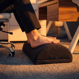 Ergonomic footrest for comfortable desk sitting